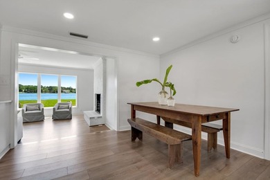 This Lake Home is truly a rare gem! Nestled along 165 Feet of - photo 6