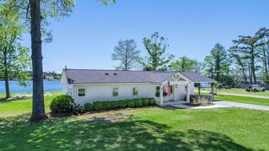This Lake Home is truly a rare gem! Nestled along 165 Feet of - photo 9