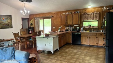 Handyman Special with Incredible potential on 1.18 acres!Welcome - photo 4
