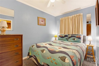 Discover the Savannah Beach & Racquet Club, a gated waterfront - photo 3