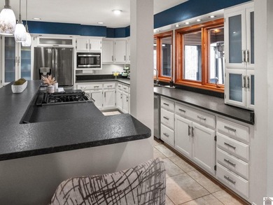 This stunning, sprawling ranch-style home with finished basement - photo 11