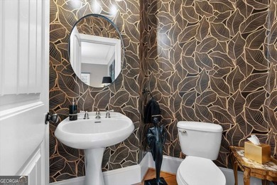 Tucked into a beautifully designed setting, this meticulously - photo 27
