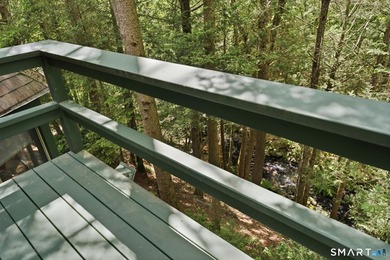 Tucked away in a peaceful wooded setting along the Blackledge - photo 32