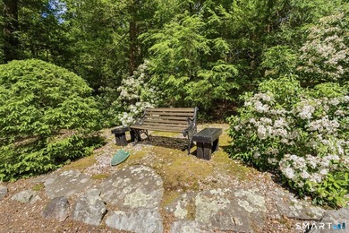 Tucked away in a peaceful wooded setting along the Blackledge - photo 36