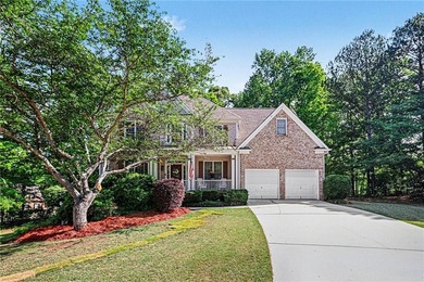 Step into this spacious 4-bedroom, 2.5-bath traditional on a - photo 1