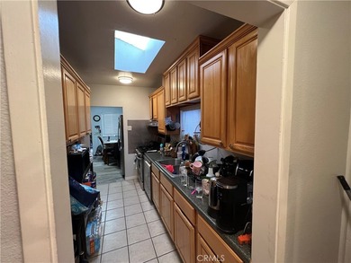 2-bedroom home featuring modern light fixtures, laminate - photo 4