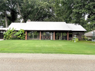 Must see this gem!  Huge lot with beautiful front yard and back - Lake Home For Sale in Pittsburg, Texas