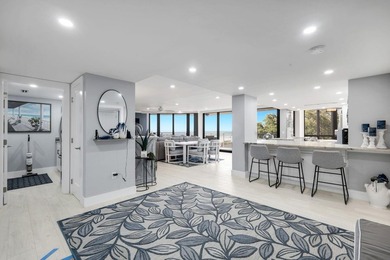 Experience the pinnacle of seaside living in this exquisitely - photo 3