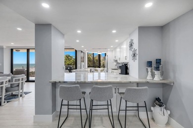 Experience the pinnacle of seaside living in this exquisitely - photo 5