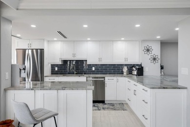 Experience the pinnacle of seaside living in this exquisitely - photo 6
