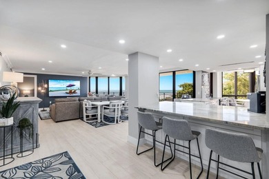 Experience the pinnacle of seaside living in this exquisitely - photo 9
