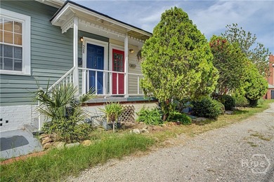 Welcome home to this charming Savannah bungalow, where historic - photo 1