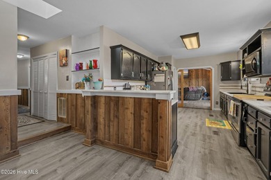 Sunset Beach waterfront gem! This 3-bed, 3.5-bath home offers - photo 13