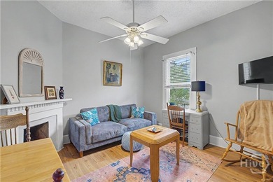 Welcome home to this charming Savannah bungalow, where historic - photo 3