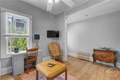 Welcome home to this charming Savannah bungalow, where historic - photo 4