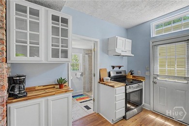 Welcome home to this charming Savannah bungalow, where historic - photo 8