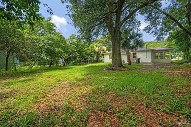 Completely renovated and move-in ready. This home features an - photo 30