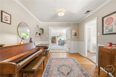 Full of historic charm, this 1950-built bungalow sits in - photo 7