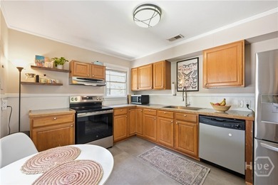 Full of historic charm, this 1950-built bungalow sits in - photo 8