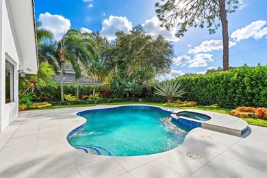 Sited amidst the lush splendor of Les Jardins, a prestigious - photo 7