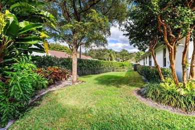 Sited amidst the lush splendor of Les Jardins, a prestigious - photo 9