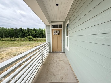 Welcome to Riverside Cove and the wonderful McKenzie Home Plan - photo 3