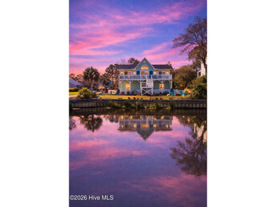 Welcome to 330 Cape Lookout Loop in the sought-after gated - photo 1