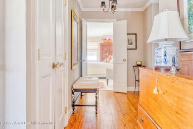 Perched on a commanding 4.5-acre hilltop, this magnificent brick