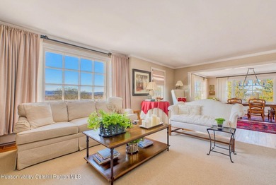 Perched on a commanding 4.5-acre hilltop, this magnificent brick