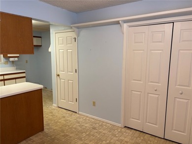 One of the largest condos in White Oak Station features a beamed - photo 11