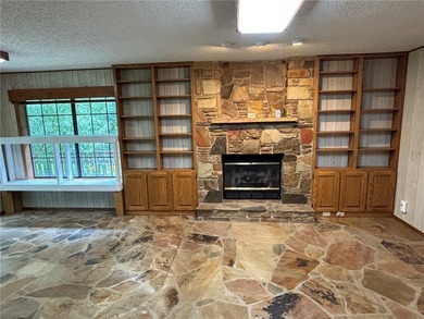 One of the largest condos in White Oak Station features a beamed - photo 13