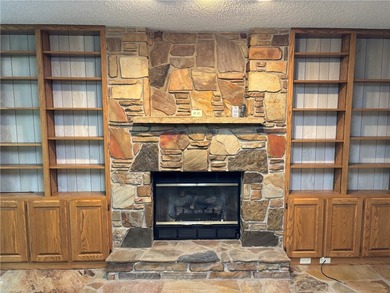 One of the largest condos in White Oak Station features a beamed - photo 14