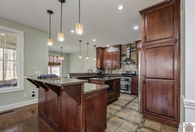 Experience lake living in this beautifully designed 4 bedroom, 3 - photo 14