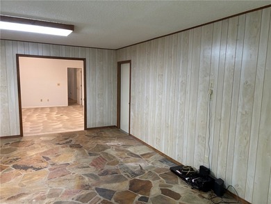 One of the largest condos in White Oak Station features a beamed - photo 17