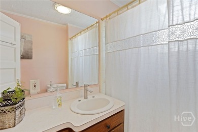 Charming Midtown brick ranch on a corner lot featuring a covered - photo 18