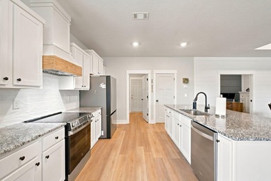 Welcome home to one of the area's most impressive newer - photo 20