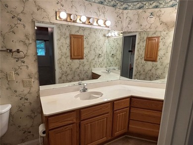 One of the largest condos in White Oak Station features a beamed - photo 21