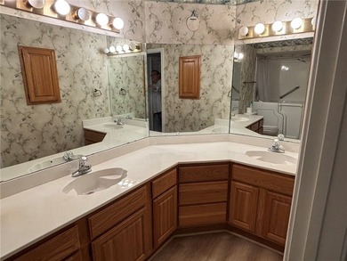 One of the largest condos in White Oak Station features a beamed - photo 22