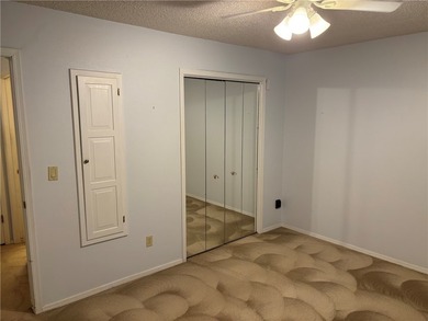 One of the largest condos in White Oak Station features a beamed - photo 26