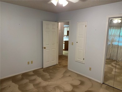 One of the largest condos in White Oak Station features a beamed - photo 29