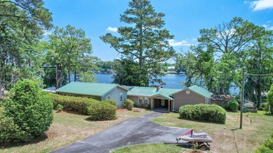 LOCATION! LOCATION! LOCATION!!! Tucked along the shores of Lake - photo 1