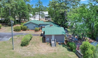 LOCATION! LOCATION! LOCATION!!! Tucked along the shores of Lake - photo 8