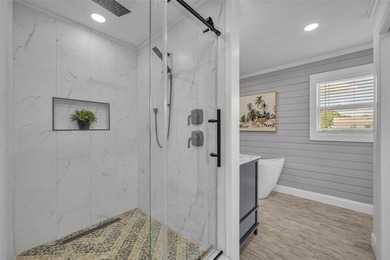 Grab your flip flops, beach cruiser, and paddleboard-your New - photo 12