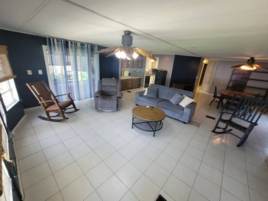 The property features a New roof and tile flooring throughout - photo 12