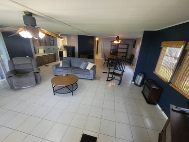 The property features a New roof and tile flooring throughout - photo 13