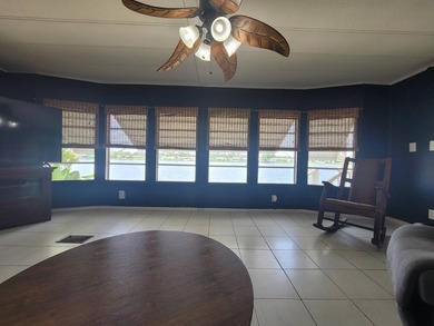The property features a New roof and tile flooring throughout - photo 15