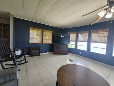 The property features a New roof and tile flooring throughout - photo 16