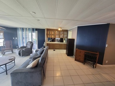 The property features a New roof and tile flooring throughout - photo 17