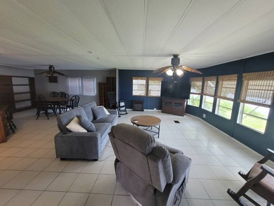 The property features a New roof and tile flooring throughout - photo 21