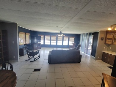 The property features a New roof and tile flooring throughout - photo 25